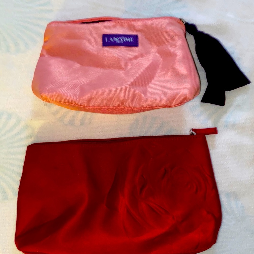 Lancôme makeup pouches.